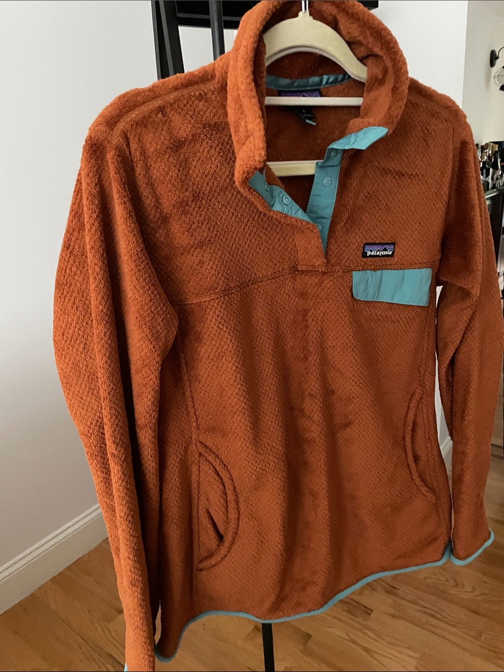 Patagonia Women’s Rust Orange Fleece Pullover with Teal Trim